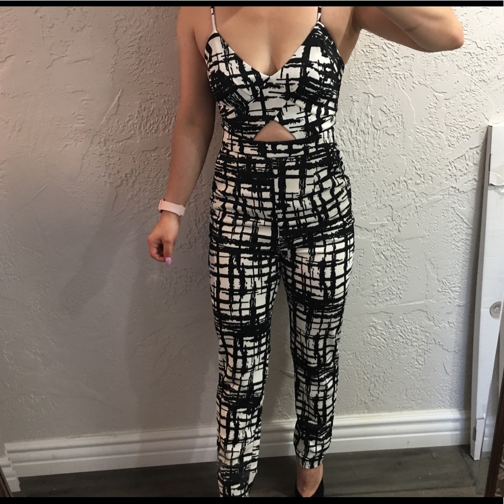 New with tags!! Black and white jumpsuit